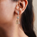14k gold spiral earrings with Polki diamonds in a sculptural helix design.
