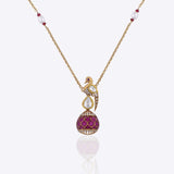9K gold swan-inspired pendant with Polki diamonds and a pink-hued drop.