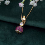 9K gold swan-inspired pendant with Polki diamonds and a pink-hued drop.