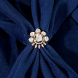 Gold floral ring with uncut diamond petal clusters around an oval center.