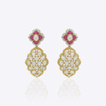 14K gold Petal Prism Earrings with pink gemstones and cascading uncut diamonds.