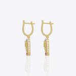 9K gold teardrop earrings with Polki detailing and delicate diamond accents.
