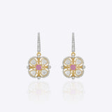 9K gold drop earrings with uncut diamonds and a pink gemstone center