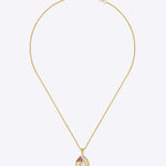 9K gold openwork sphere pendant with a central Polki uncut diamond.
