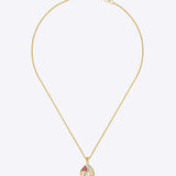 9K gold openwork sphere pendant with a central Polki uncut diamond.