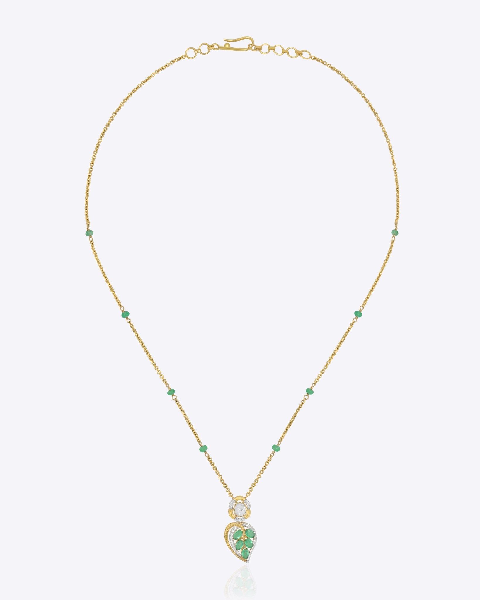 Teal Leaf Pendant in 9K gold with teal gemstone stations and a pear-cut teal drop.