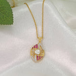 9K gold openwork sphere pendant with a central Polki uncut diamond.