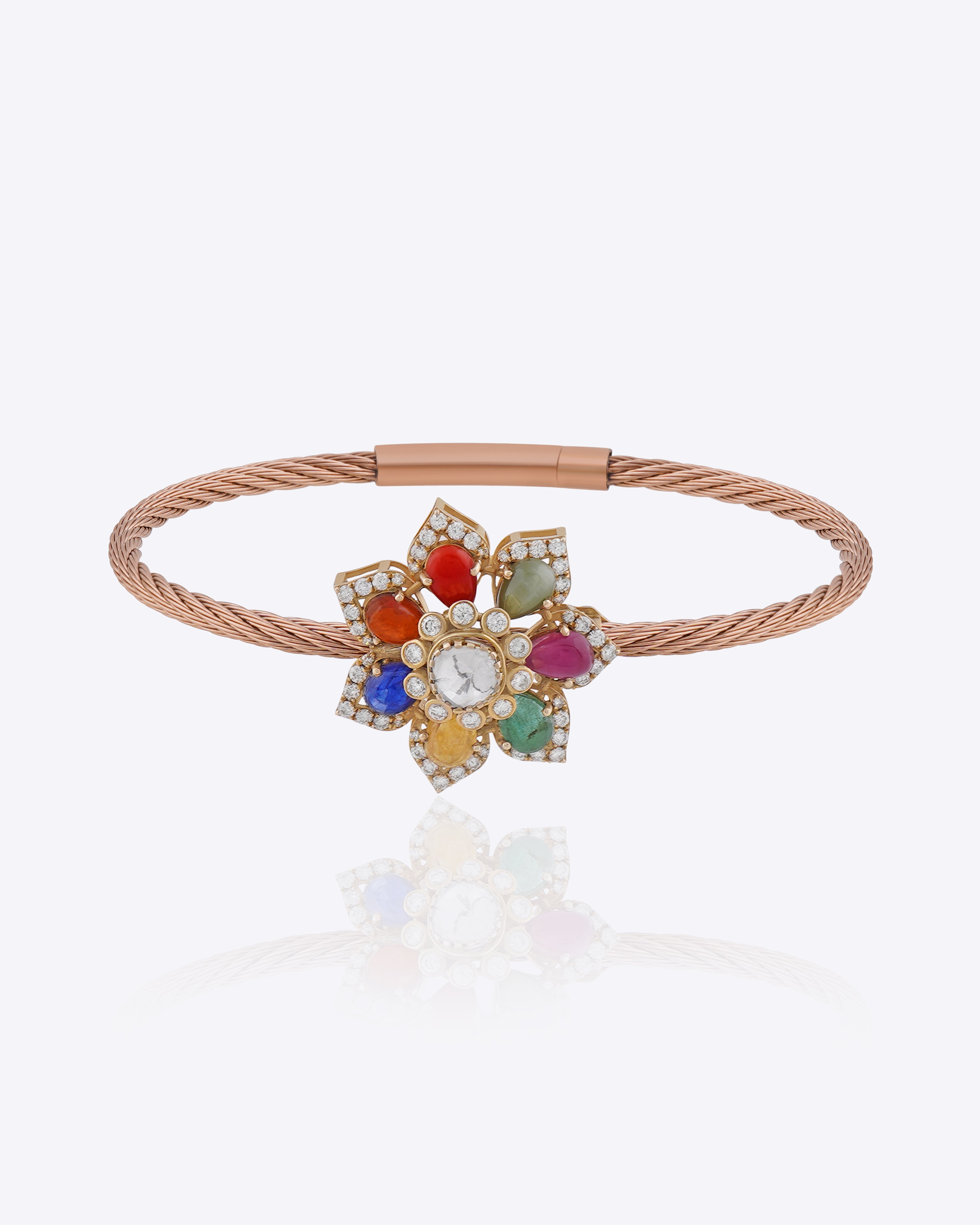 Floral bracelet with Navratna gemstones, Polki centre, diamond detailing and textured ban