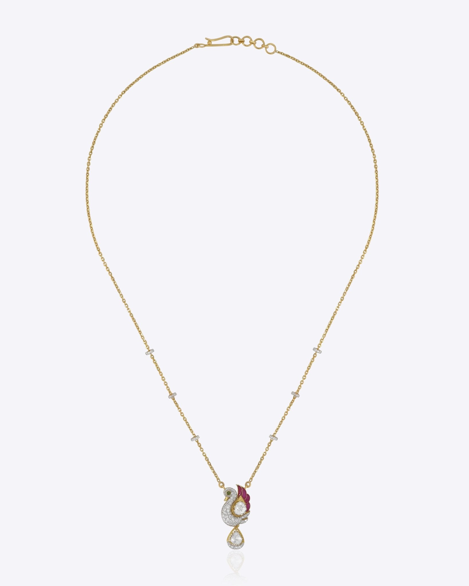 Swan Grace Pendant in 14K gold with a floral motif, uncut diamonds, and pink gemstones.