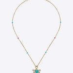 9K gold pendant with a teal enamel floral motif and Polki diamond accents