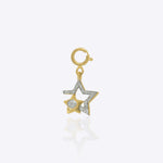 Twofold Star Charm in 14K gold featuring two radiant star motifs, one large and one small.