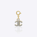 14k gold embrace-shaped charm with Polki, symbolizing comfort and togetherness