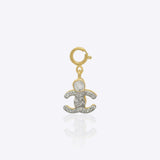 14k gold embrace-shaped charm with Polki, symbolizing comfort and togetherness
