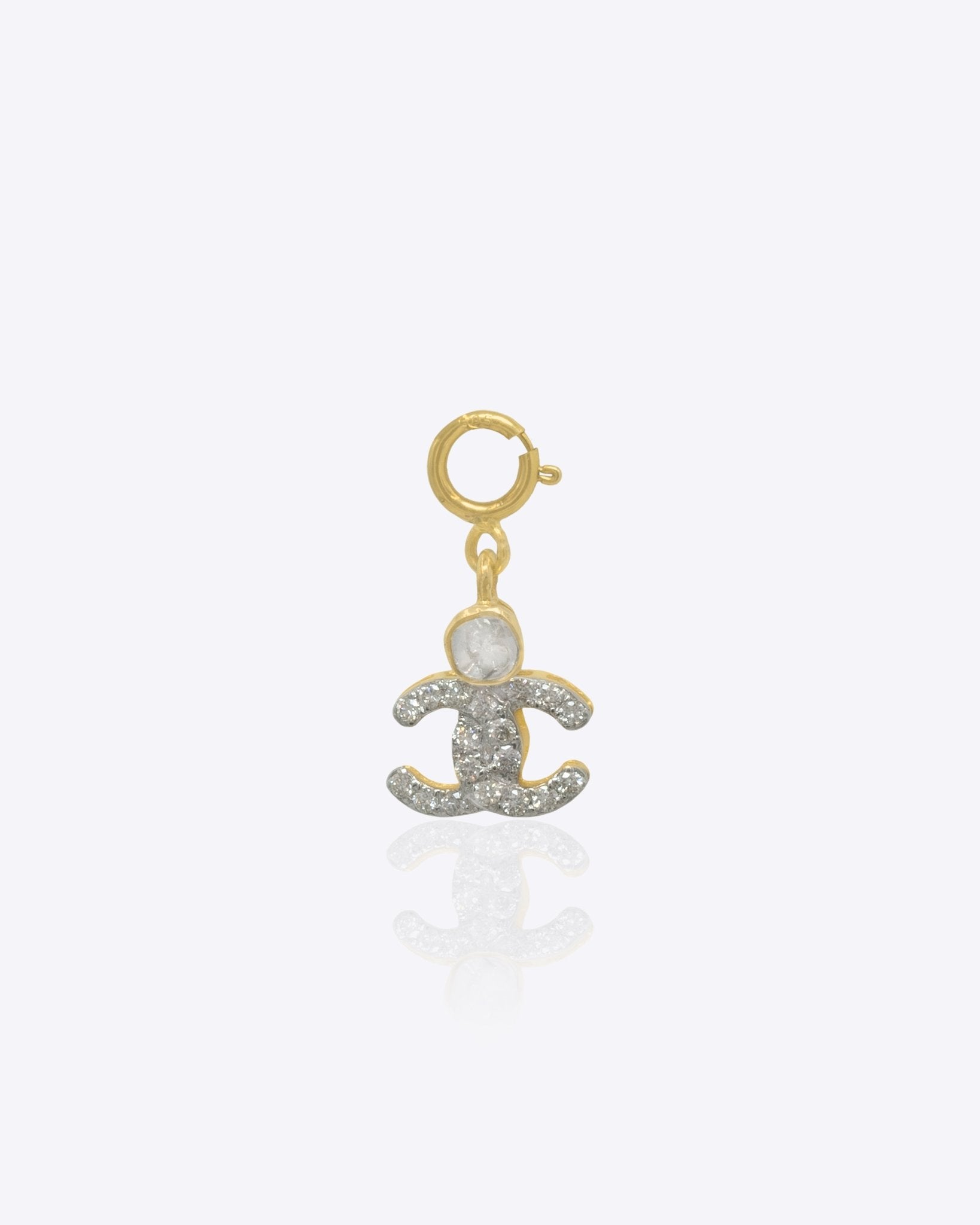 14k gold embrace-shaped charm with Polki, symbolizing comfort and togetherness
