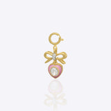 Sweetheart Bow Charm in 14K gold with a bow-tied heart and Polki accents.