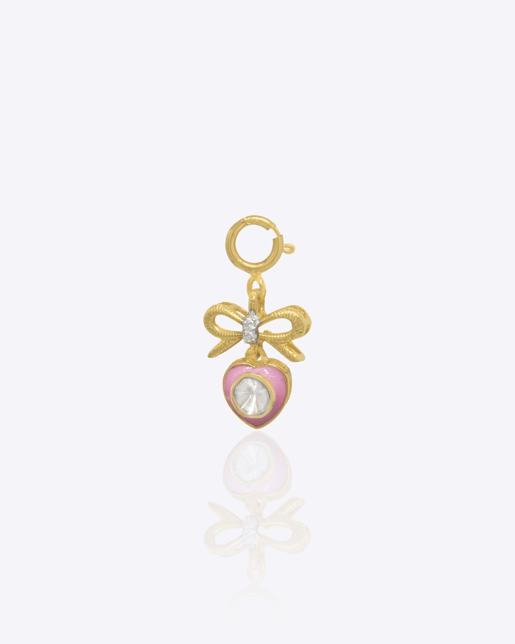 Sweetheart Bow Charm in 14K gold with a bow-tied heart and Polki accents.