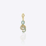 Musical note charm in 14K gold with Polki and diamond sparkle detailing.