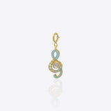 Musical note charm in 14K gold with Polki and diamond sparkle detailing.