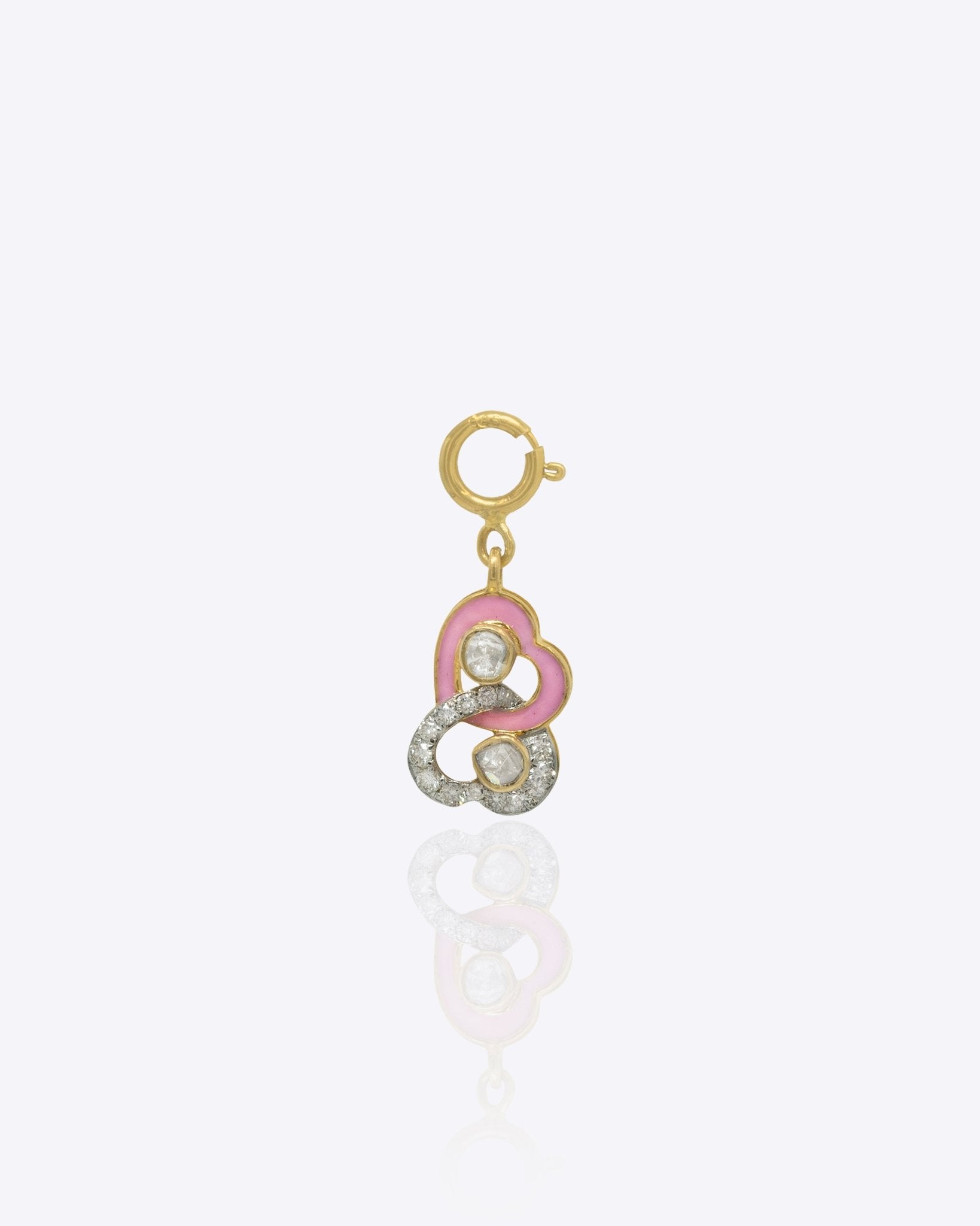 14k gold charm with two interlocked hearts and Polki sparkle