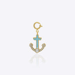 14k gold Ocean Tether charm with Polki diamond detailing.