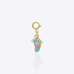 Angel wing charm in 14K gold with delicate Polki sparkle detailing.