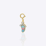 Angel wing charm in 14K gold with delicate Polki sparkle detailing.