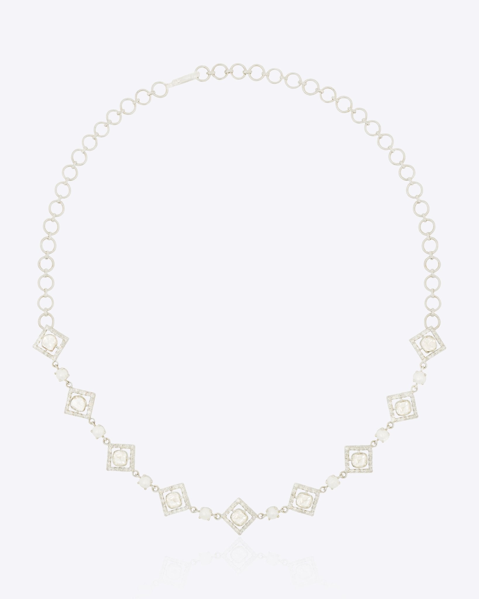 Geometric Polki diamond necklace in 14K gold with lustrous pearl accents.