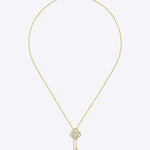 14kt gold necklace with woven knot design and Polki center