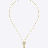 14kt gold necklace with woven knot design and Polki center