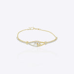 14K gold bracelet with intricate interwoven design and luminous polished finish in a modern minimalist style.