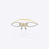 14K gold bracelet with an elegant bow design and vibrant interlaced stones creating a refined statement look.