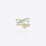 14K gold ring with a sleek ribbon-inspired bow design and refined polished finish.