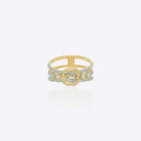 14kt gold ring featuring a sculptural interwoven knot design with a polished, luminous architectural finish.
