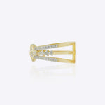 14K gold ring with an interwoven knot design set with Polki diamonds.