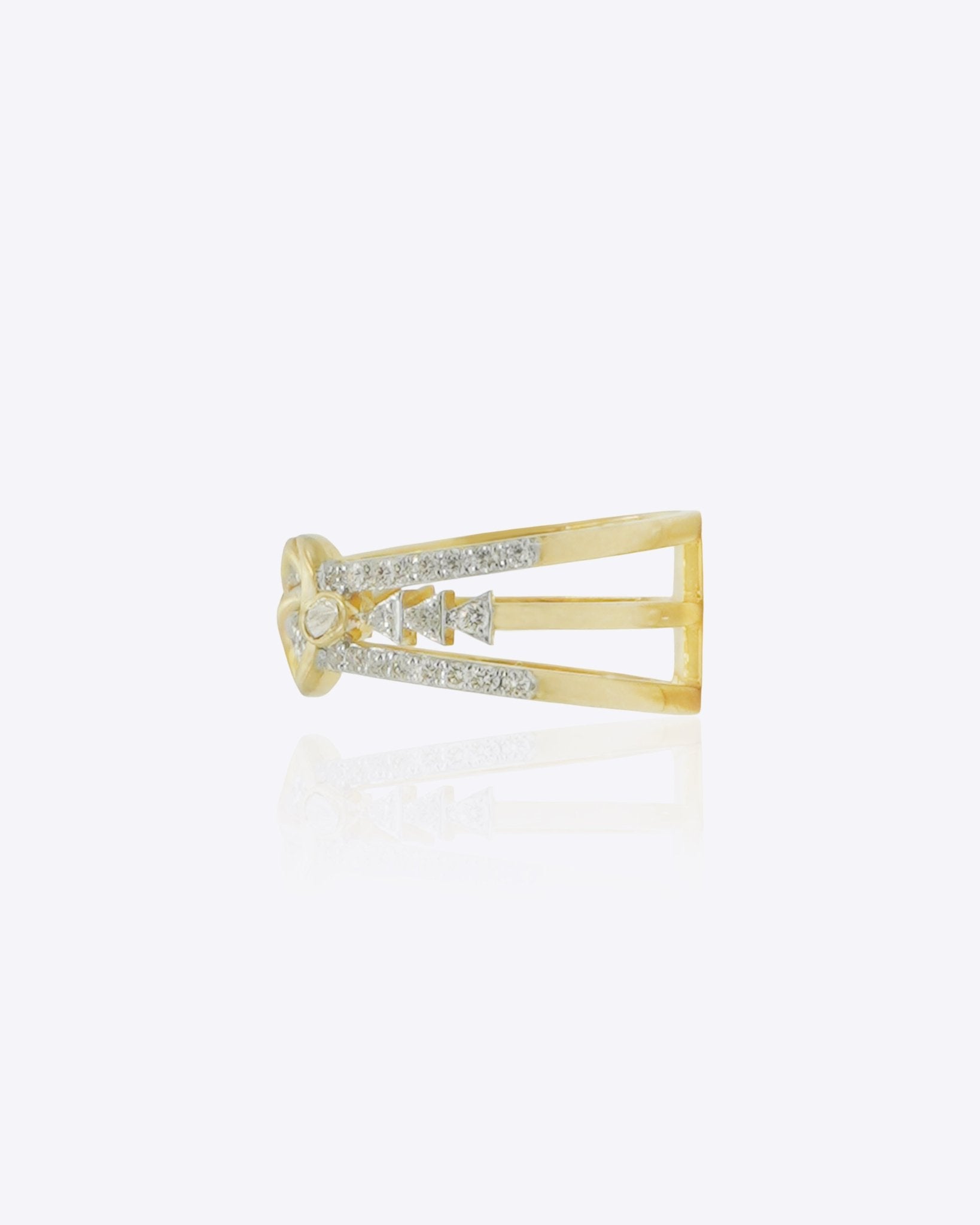 14K gold ring with an interwoven knot design set with Polki diamonds.