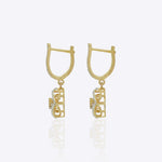 14K gold woven-texture knot earrings with a central luminous stone.