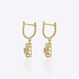 14K gold woven-texture knot earrings with a central luminous stone.