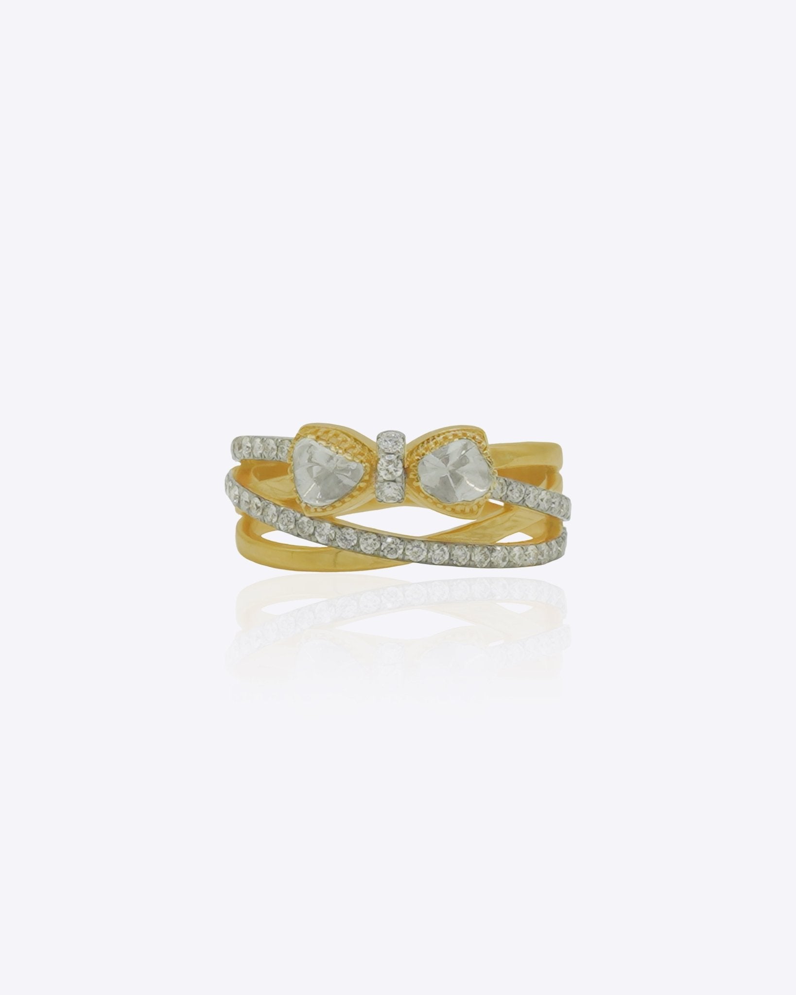 Radiant Bow Ring in 14K gold with a whimsical bow motif on interlocking bands