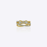 Gold bow ring with triple interlocking bands and shimmering stones in a tiered statement design.
