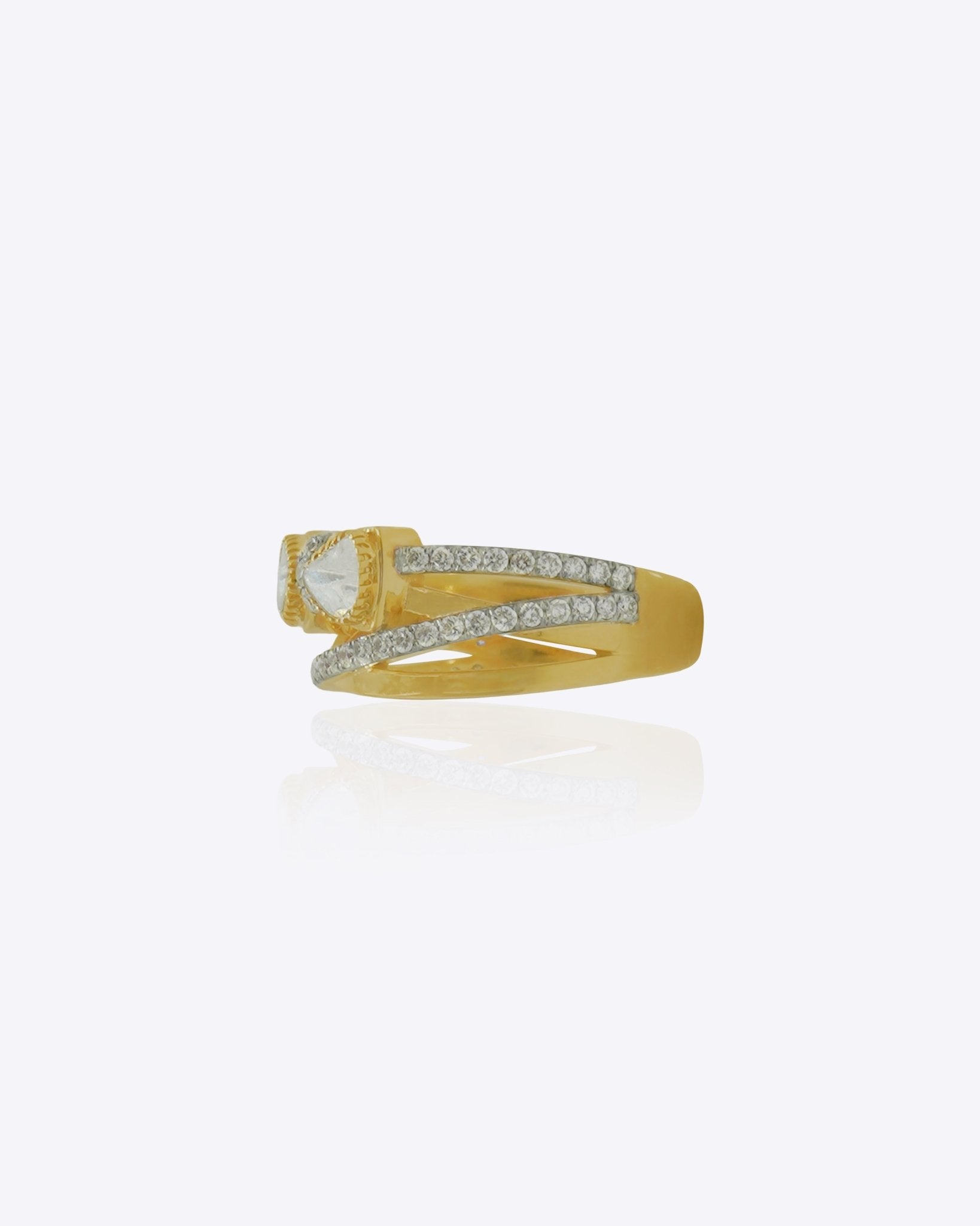 Radiant Bow Ring in 14K gold with a whimsical bow motif on interlocking bands