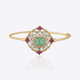 Aqua Legacy gold open bangle with geometric Polki motif, aqua gemstone centre and enamel detailing.