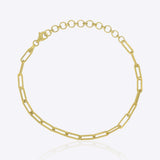 18K solid gold paper clip chain bracelet, shown worn solo for an everyday minimal look.