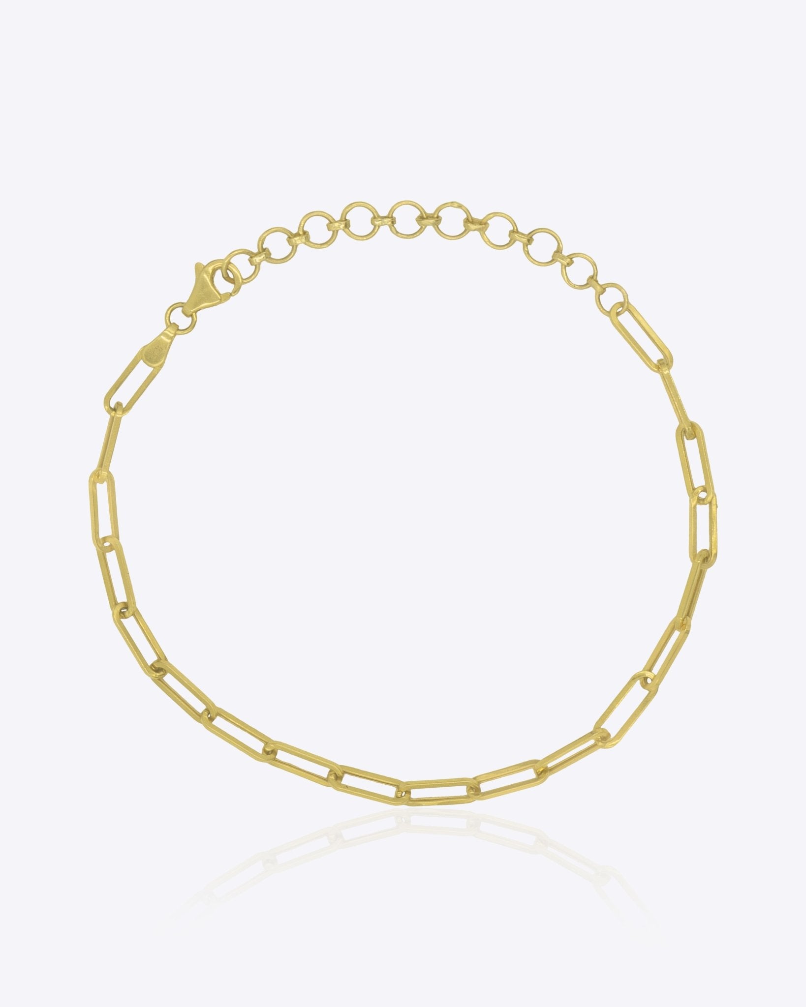 18K solid gold paper clip chain bracelet, shown worn solo for an everyday minimal look.