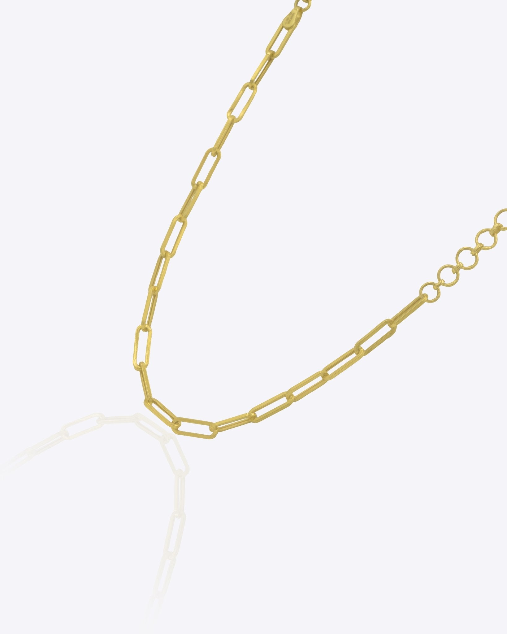 18K solid gold paper clip chain bracelet, shown worn solo for an everyday minimal look.