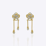 14K gold drop earrings with pear-shaped stones and knot motif