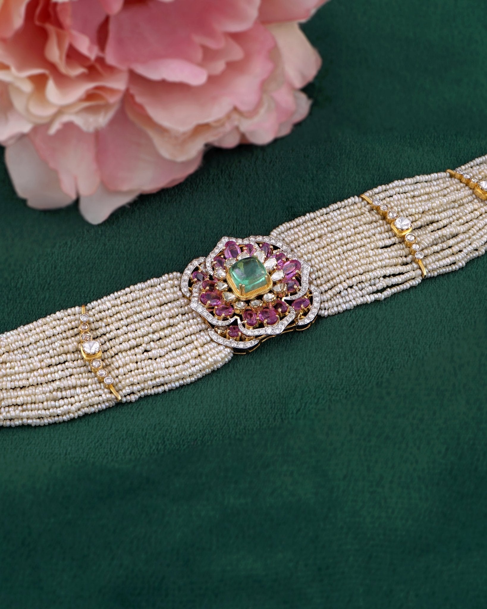 Rose Eclat Choker in gold with layered Polki rows and a ruby-emerald floral centrepiece