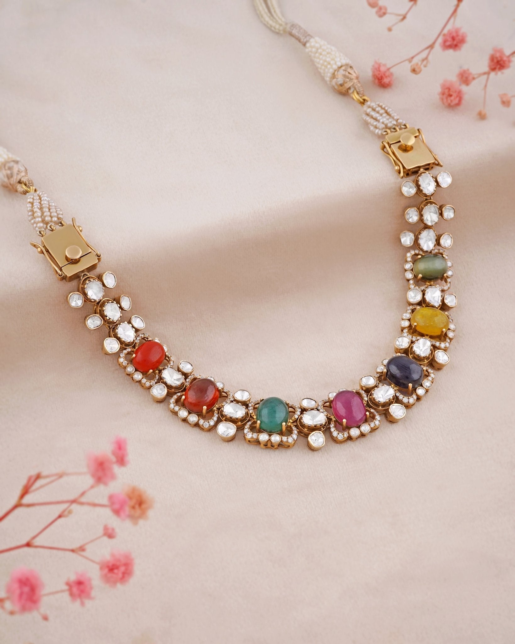 14K gold Navratna Fluttering necklace with vibrant Navratna stones and a Polki border.