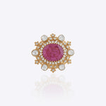 Blush Halo Ring featuring a large pink center stone encircled by a pearl halo with Polki detailing.
