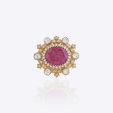 Blush Halo Ring featuring a large pink center stone encircled by a pearl halo with Polki detailing.