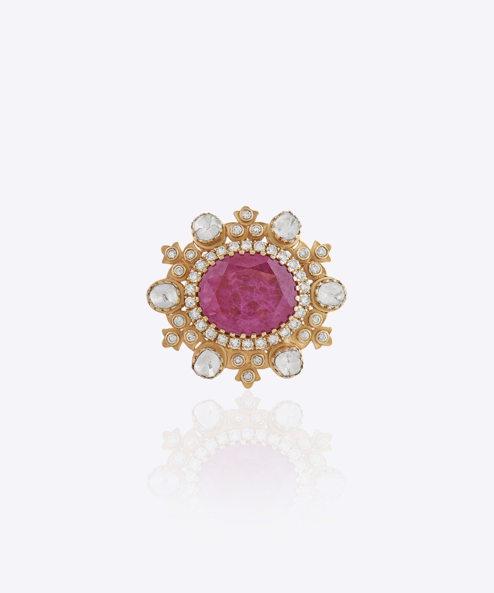 Blush Halo Ring featuring a large pink center stone encircled by a pearl halo with Polki detailing.